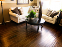 Hardwood Gallery - Dark Hardwood in this Living Room Adds Elegance.